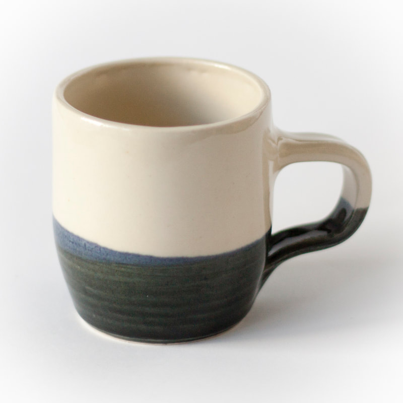 Artefact:Mug Background:White Clay:PB103 Collective:Single Glaze:ClearGloss Glaze:SchefflinBlue Orientation:Perspective