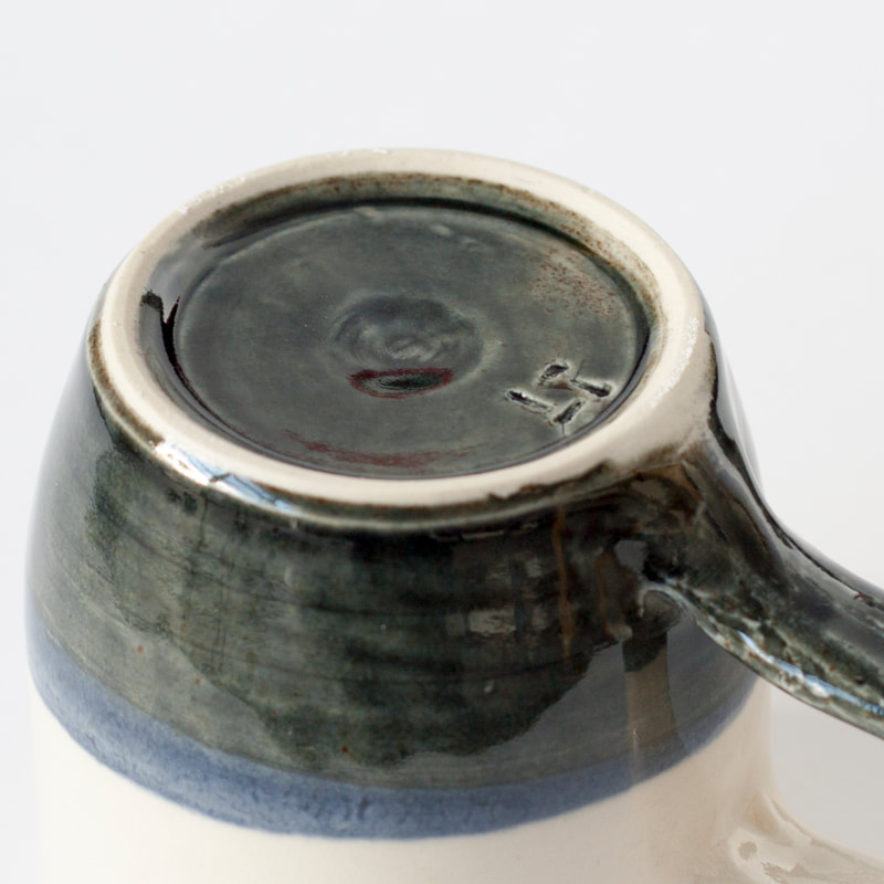 Artefact:Mug Background:White Clay:PB103 Collective:Single Glaze:ClearGloss Glaze:SchefflinBlue Orientation:Footer