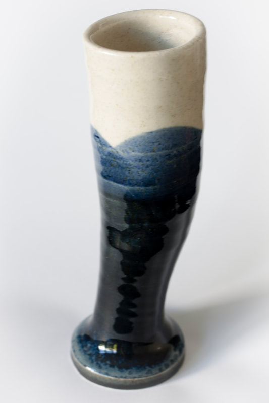 Artefact:Vase Background:White Clay:PB103 Collective:Single Glaze:ClearGloss Glaze:SchefflinBlue Orientation:Perspective