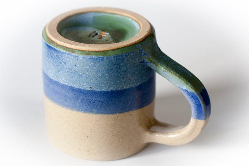 Artefact:Mug Background:White Clay:IronStone Collective:Single Glaze:ClearGloss Glaze:EarlGrey Orientation:Footer