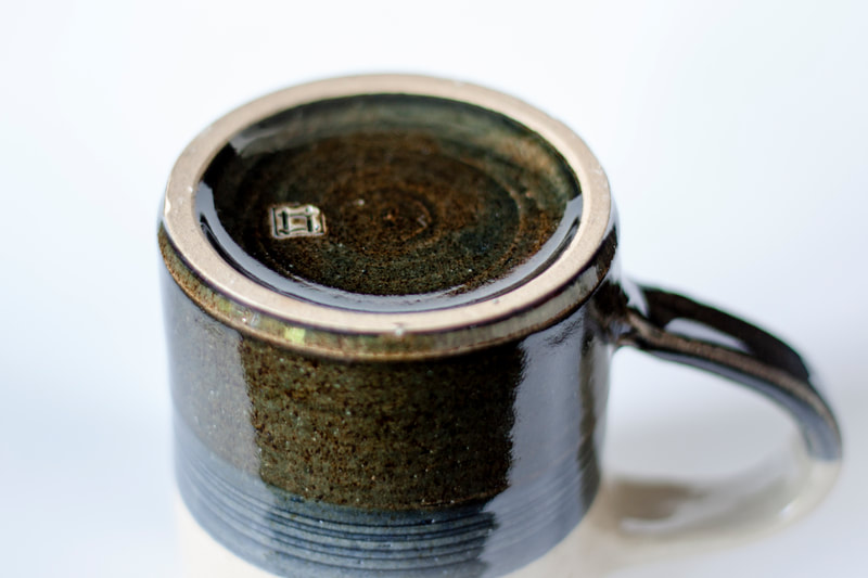 Artefact:Mug Background:White Clay:IronStone Collective:Single Glaze:ClearGloss Glaze:SchefflinBlue Orientation:Footer
