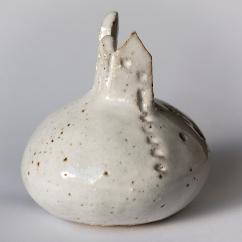 Artefact:Vase Background:White Clay:Raku Collective:Single Glaze:TafeWhite Orientation:Perspective