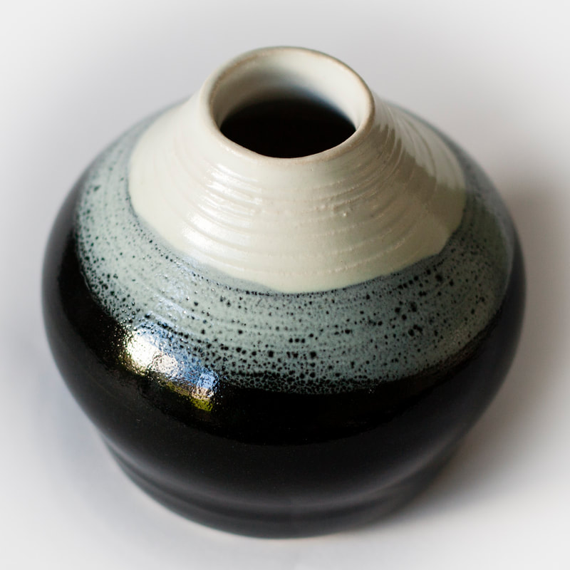 Artefact:Vase Background:White Clay:PB103 Collective:Single Glaze:LinShinBlack Glaze:TafeWhite Orientation:Perspective