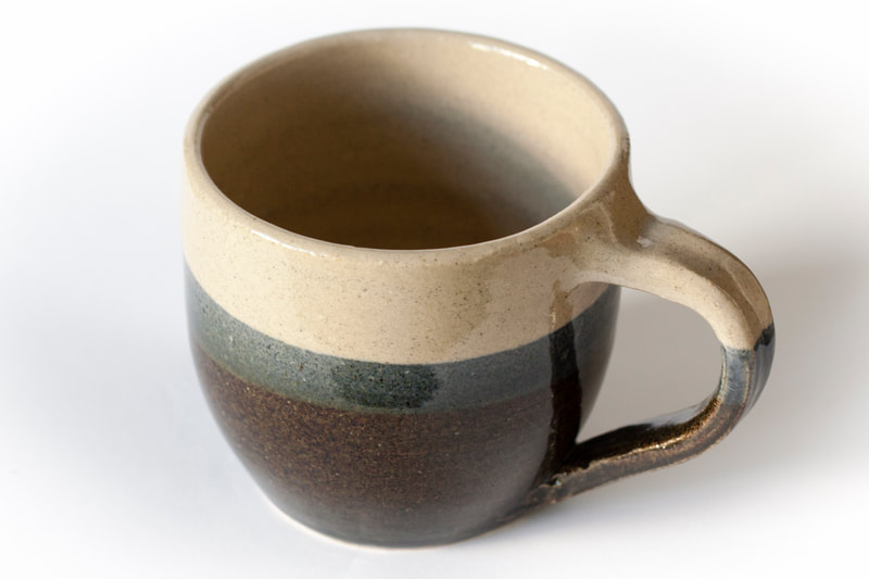 Artefact:Mug Background:White Clay:IronStone Collective:Single Glaze:ClearGloss Glaze:SchefflinBlue Orientation:Perspective