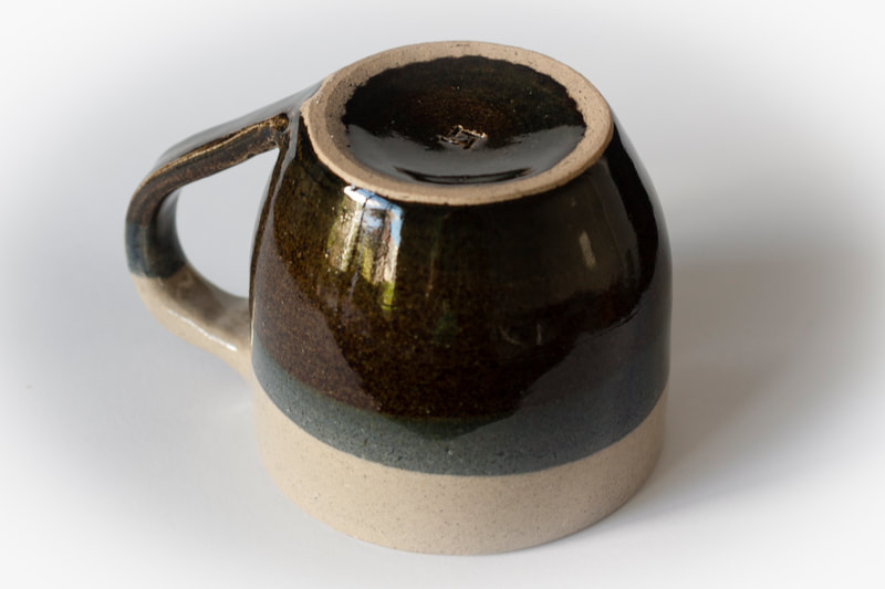 Artefact:Mug Background:White Clay:IronStone Collective:Single Glaze:ClearGloss Glaze:SchefflinBlue Orientation:Footer